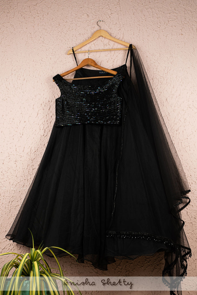 JADE BLACK ORGANZA LEHENGA WITH OFFSHOULDER SEQUENCE BLOUSE AND TASSEL DUPATTA