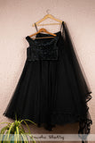 JADE BLACK ORGANZA LEHENGA WITH OFFSHOULDER SEQUENCE BLOUSE AND TASSEL DUPATTA