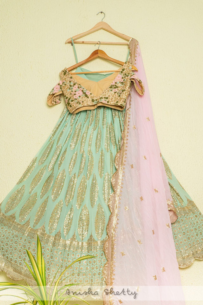 MINT GREEN SEQUENCE LEHENGA WITH OYSTER FLORAL BLOUSE & PINK DUPATTA